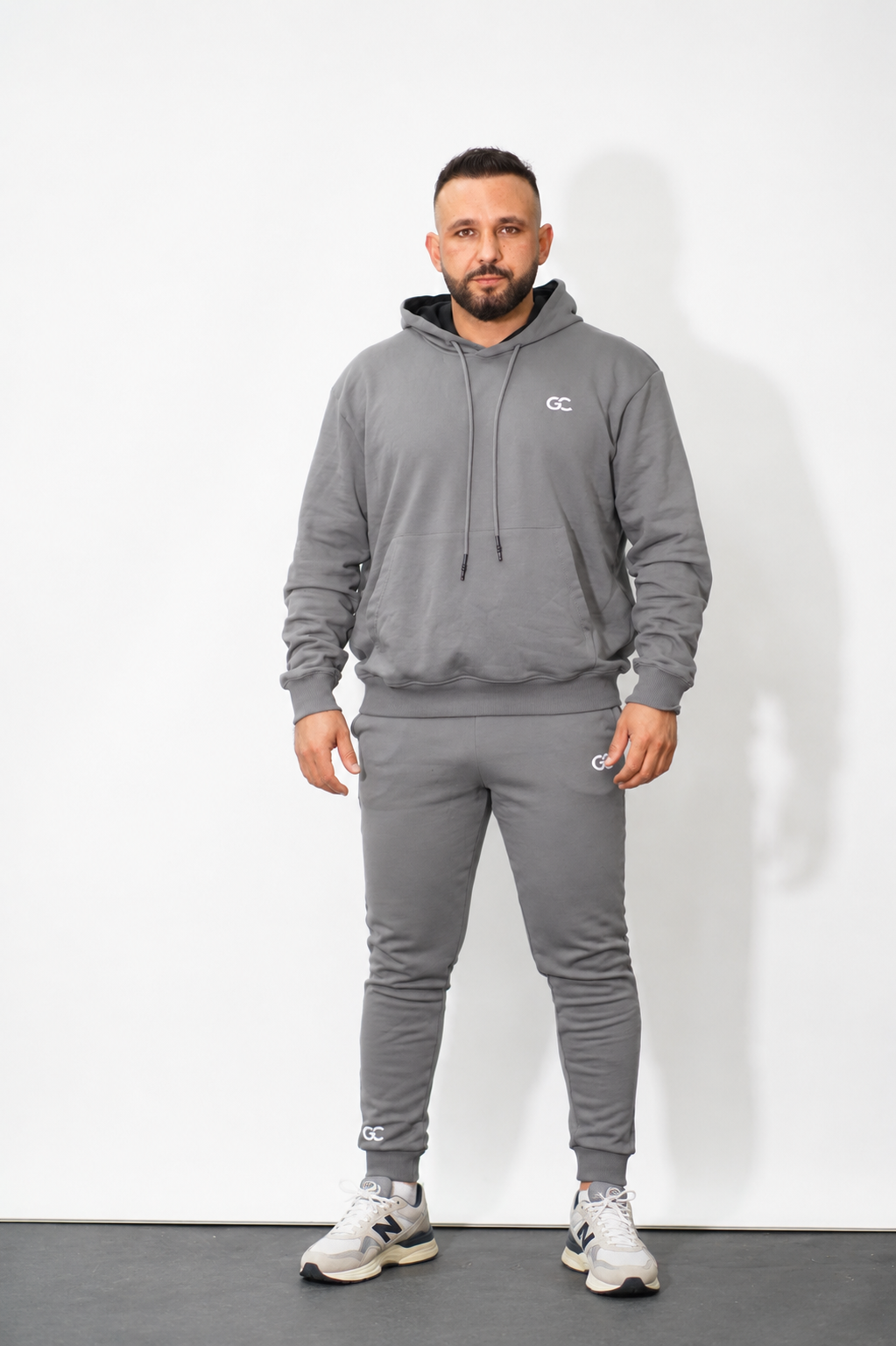 GC SIGNATURE TRACKSUIT-IN STONE GREY