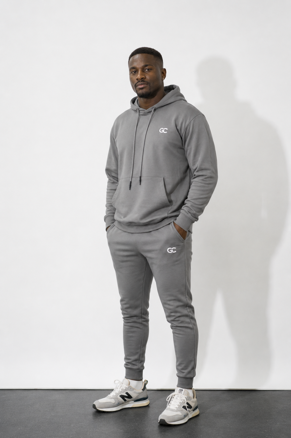 GC SIGNATURE TRACKSUIT-IN STONE GREY